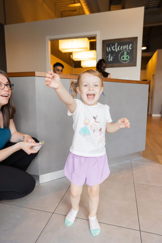 Happy Child At Chiropractic Clinic Joyful Toddler In Clinic Lobby